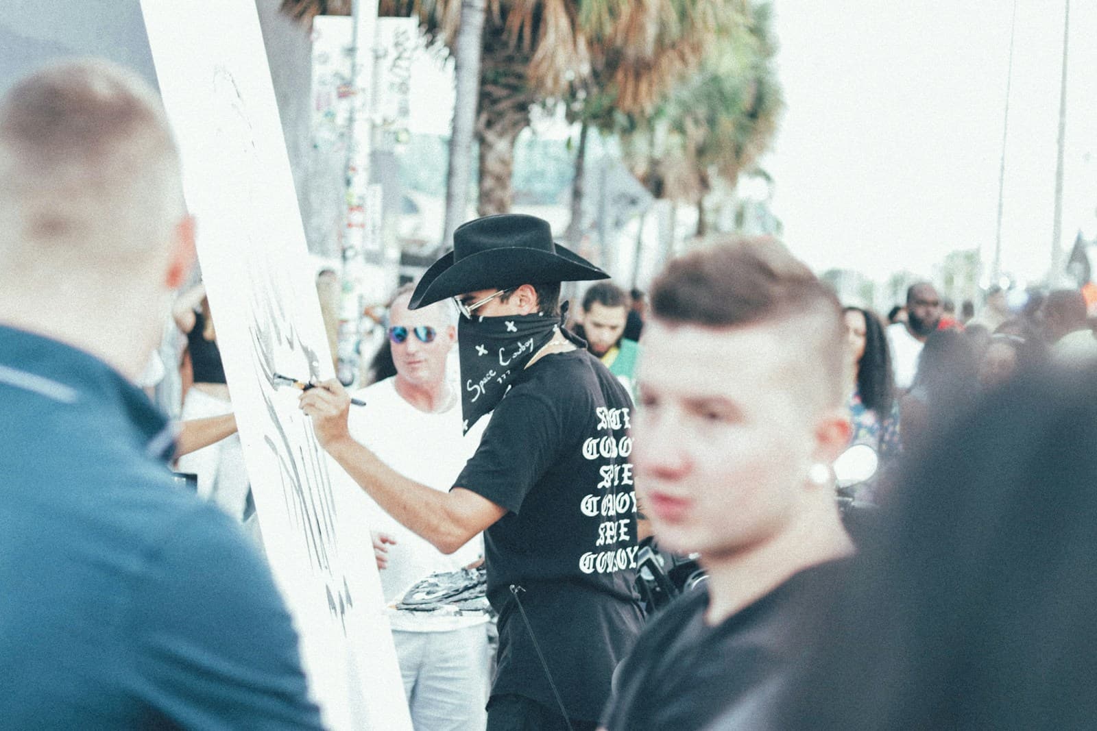 Artist painting street mural in Wynwood
