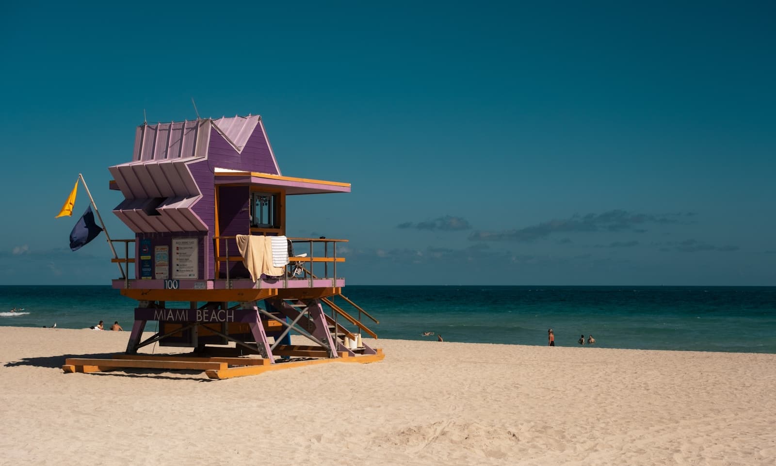Purple lifeguard tower on Miami Beach sand